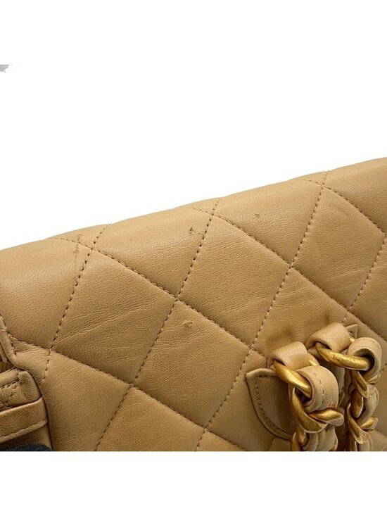 Chanel CC Logo Quilted Chain Lambskin Backpack
